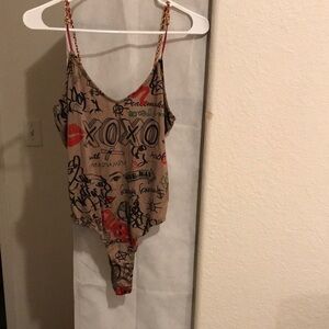 Girls Beige Graphic One-Piece Bodysuit with Red Accents